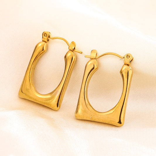 A pair of Dainty Earrings featuring a sleek and minimal design, perfect for effortless everyday elegance.
