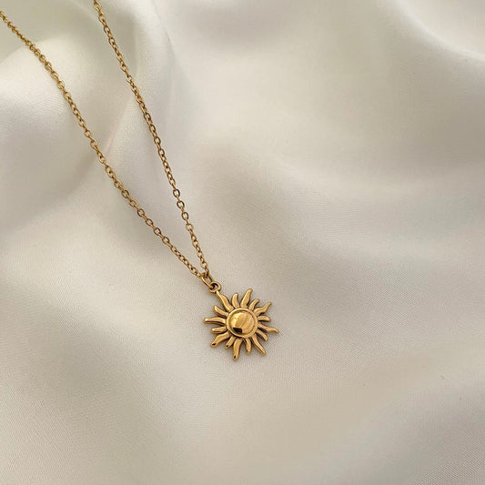 Radiant Surya necklace featuring a sun-inspired pendant,perfect for adding light and elegance to everyday or special occasions.